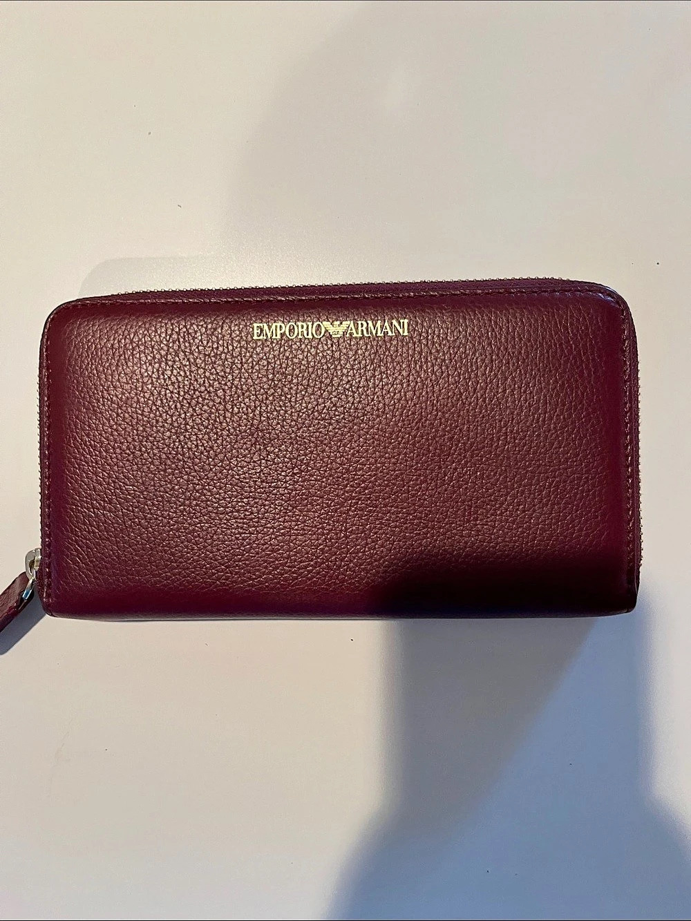 Emporio Armani Wallet in pebbled leather with a zip around closure Pebbled